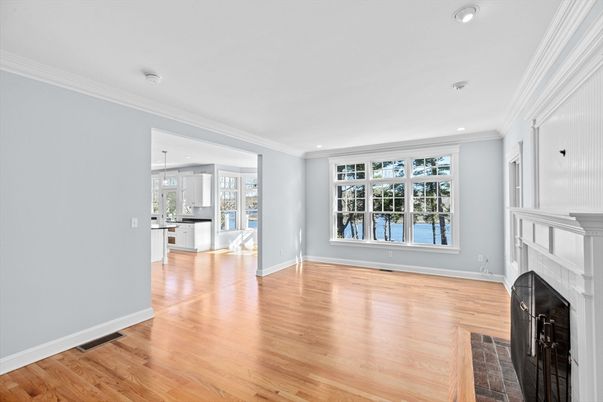 Empty room, Fireplace, Interior, Kitchen, Pendant Lights, Recessed Lighting, Wood Texture Flooring