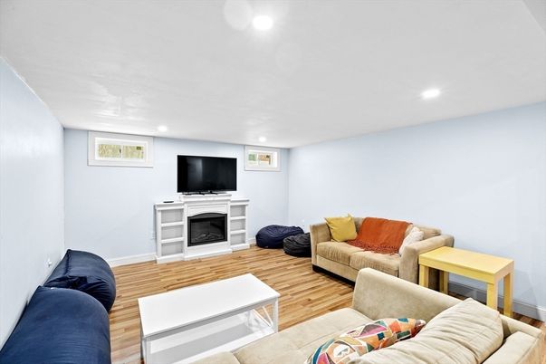Fireplace, Interior, Living room, Recessed Lighting, Wood Texture Flooring