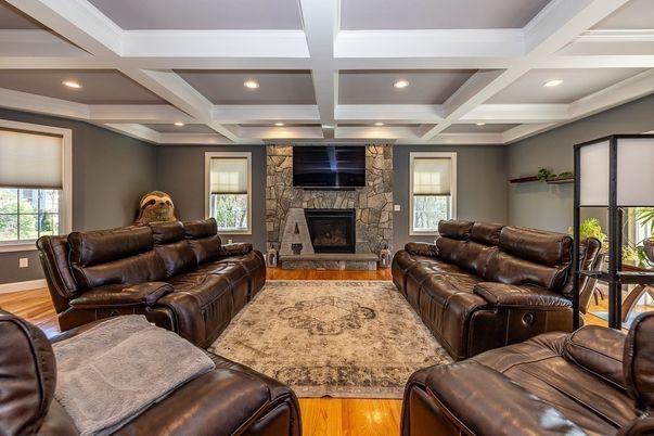 Fireplace, Interior, Living room, Recessed Lighting, Stone Walls, Wood Texture Flooring