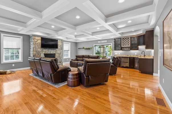 Fireplace, Interior, Living room, Recessed Lighting, Stone Walls, Wood Texture Flooring