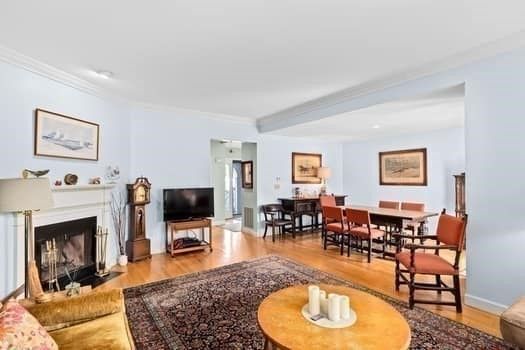 Dining room, Fireplace, Interior, Living room, Recessed Lighting, Wood Texture Flooring