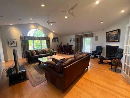 Dining room, Fireplace, Interior, Living room, Recessed Lighting, Wood Texture Flooring