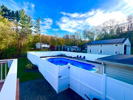 Exterior, Pool, Solar Panels