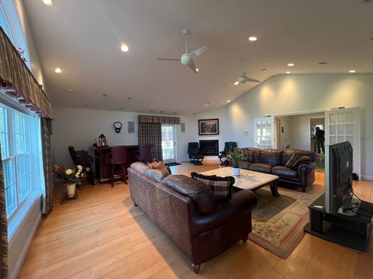 Dining room, Fireplace, Interior, Living room, Recessed Lighting, Wood Texture Flooring