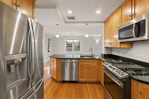 Dining room, Interior, Kitchen, Pendant Lights, Recessed Lighting, Stainless Steel Appliances, Wood Texture Flooring