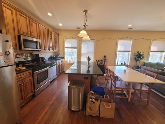 Dining room, Interior, Kitchen, Pendant Lights, Recessed Lighting, Stainless Steel Appliances, Wood Texture Flooring
