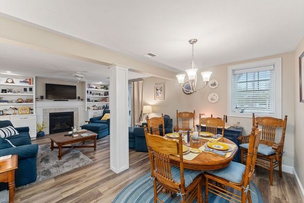 Chandelier, Dining room, Fireplace, Interior, Living room, Pendant Lights, Wood Texture Flooring