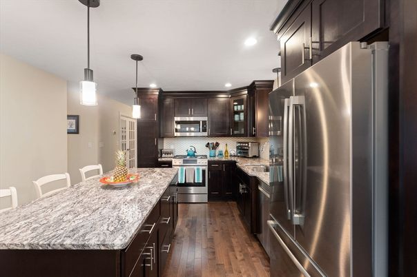Interior, Kitchen, Pendant Lights, Recessed Lighting, Stainless Steel Appliances, Wood Texture Flooring
