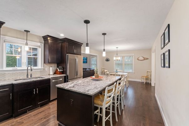 Dining room, Interior, Kitchen, Pendant Lights, Recessed Lighting, Stainless Steel Appliances, Wood Texture Flooring