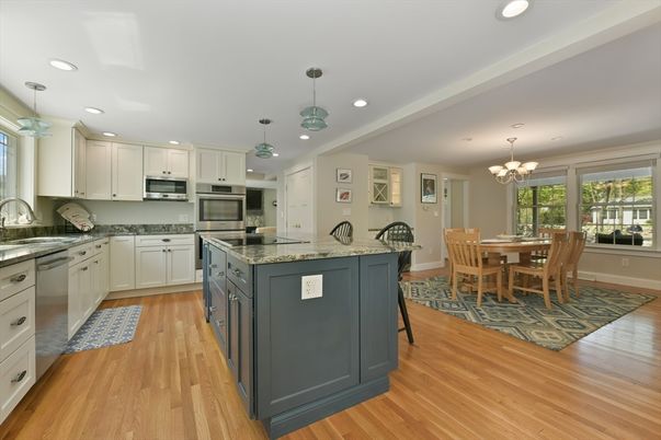 Chandelier, Dining room, Interior, Kitchen, Pendant Lights, Recessed Lighting, Stainless Steel Appliances, Wood Texture Flooring