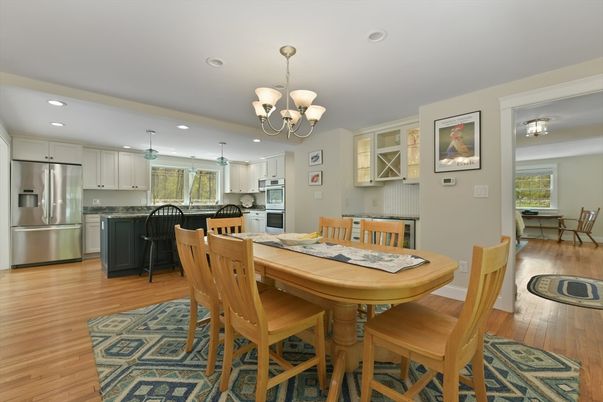 Chandelier, Dining room, Interior, Kitchen, Recessed Lighting, Stainless Steel Appliances, Wood Texture Flooring