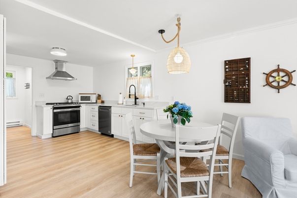 Dining room, Interior, Kitchen, Pendant Lights, Stainless Steel Appliances, Wood Texture Flooring