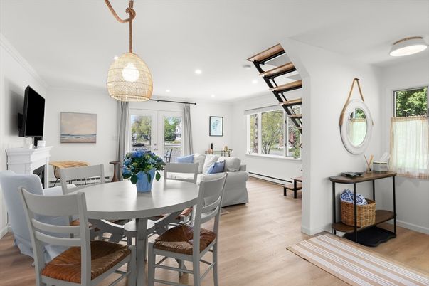 Dining room, Fireplace, Interior, Living room, Pendant Lights, Recessed Lighting, Wood Texture Flooring