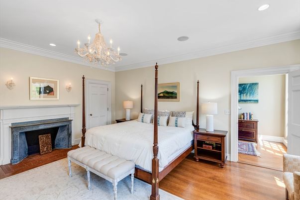 Bedroom, Chandelier, Fireplace, Interior, Recessed Lighting, Wood Texture Flooring