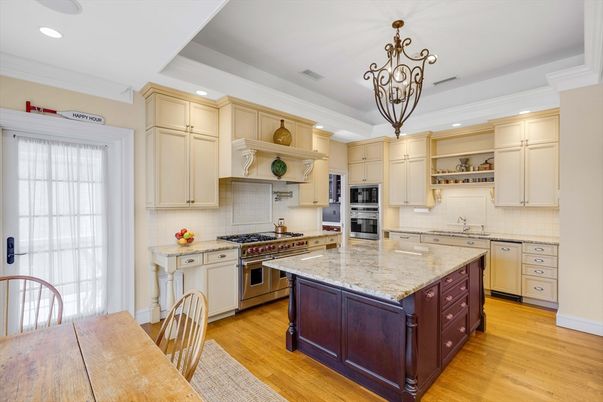Chandelier, Interior, Kitchen, Pendant Lights, Recessed Lighting, Stainless Steel Appliances, Wood Texture Flooring