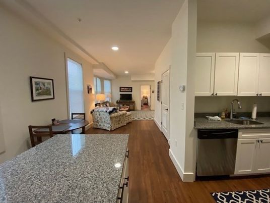Dining room, Interior, Kitchen, Living room, Recessed Lighting, Stainless Steel Appliances, Wood Texture Flooring