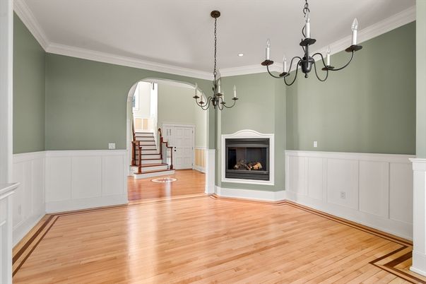 Chandelier, Empty room, Fireplace, Interior, Recessed Lighting, Wood Texture Flooring