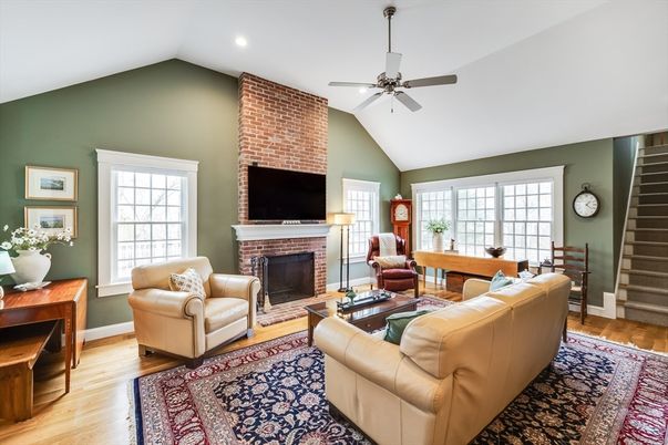 Fireplace, Interior, Living room, Recessed Lighting, Stone Walls, Wood Texture Flooring