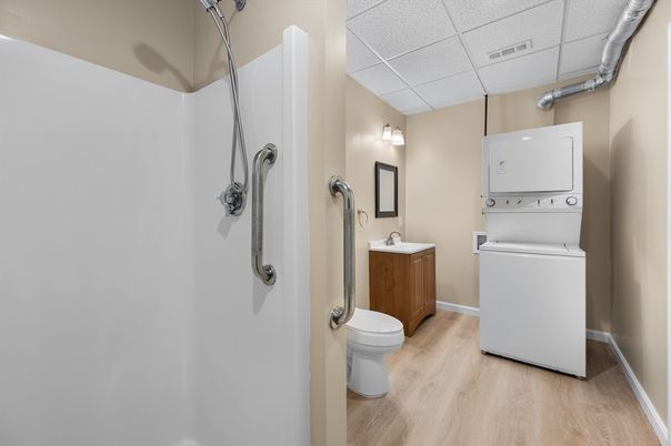 Bathroom, Interior, Utility Closets, Washer, Wood Texture Flooring