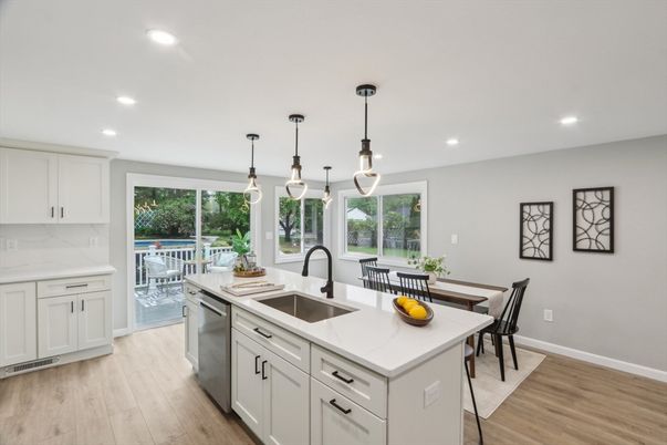 Dining room, Interior, Kitchen, Pendant Lights, Recessed Lighting, Stainless Steel Appliances, Wood Texture Flooring