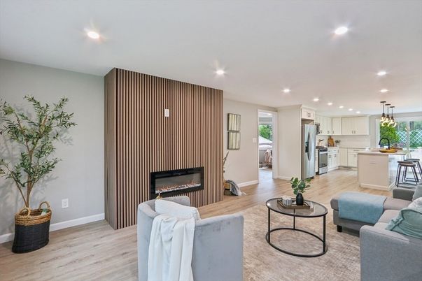 Fireplace, Interior, Kitchen, Living room, Pendant Lights, Recessed Lighting, Stainless Steel Appliances, Wood Texture Flooring
