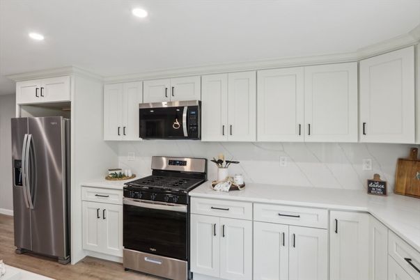 Interior, Kitchen, Recessed Lighting, Stainless Steel Appliances, Wood Texture Flooring