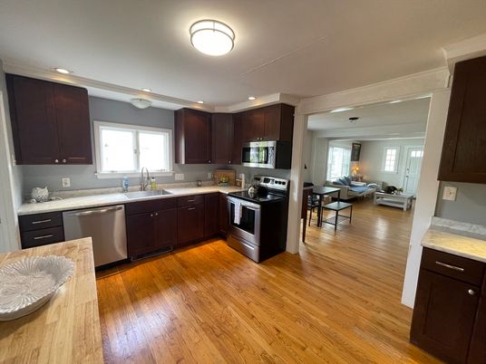 Dining room, Interior, Kitchen, Recessed Lighting, Stainless Steel Appliances, Wood Texture Flooring