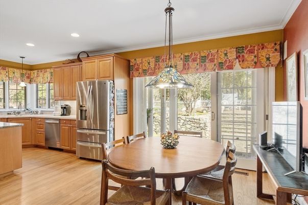 Dining room, Interior, Kitchen, Pendant Lights, Recessed Lighting, Stainless Steel Appliances, Wood Texture Flooring