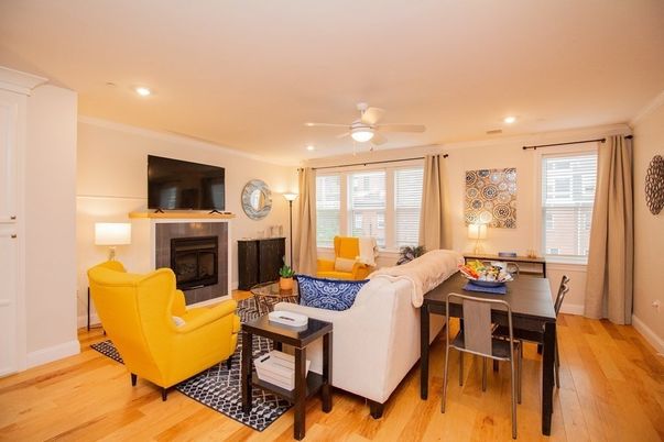 Dining room, Fireplace, Interior, Living room, Recessed Lighting, Wood Texture Flooring
