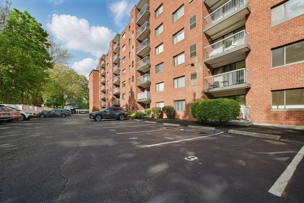 Exterior, Facade, Brick Facade, Condo Building
