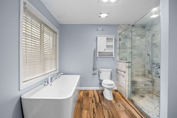Bathroom, Free Standing Baths, Glass Shower, Interior, Recessed Lighting, Wood Texture Flooring