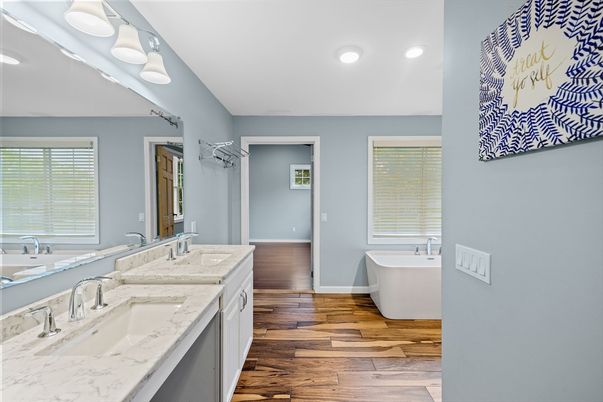 Bathroom, Dual Sink Vanities, Free Standing Baths, Interior, Recessed Lighting, Wood Texture Flooring