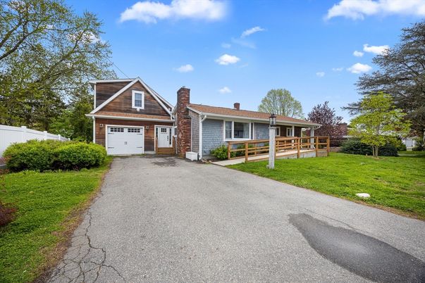 Attached, Backyard, Exterior, Facade, Brick Facade, Cape Cod