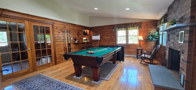 Billiard Table, Fireplace, Game Room, Interior, Recessed Lighting, Stone Walls, Wood Texture Flooring, Wooden Walls