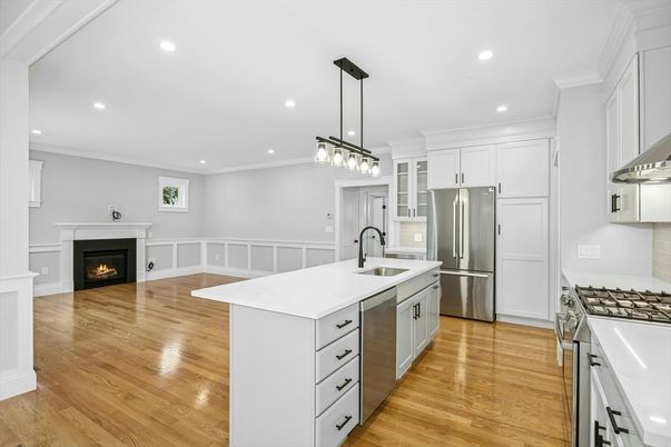 Fireplace, Interior, Kitchen, Pendant Lights, Recessed Lighting, Stainless Steel Appliances, Wood Texture Flooring