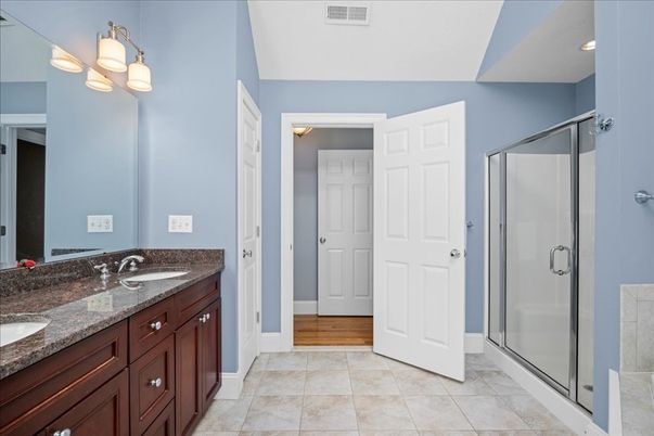 Bathroom, Dual Sink Vanities, Glass Shower, Interior, Wood Texture Flooring