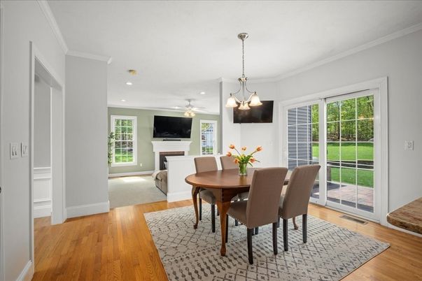 Dining room, Fireplace, Interior, Pendant Lights, Recessed Lighting, Wood Texture Flooring