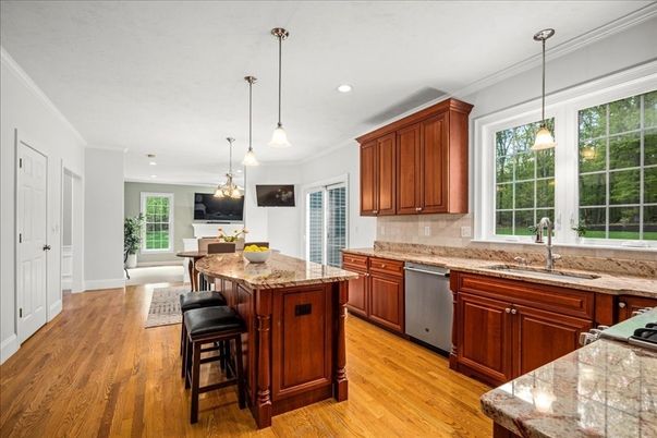 Dining room, Interior, Kitchen, Pendant Lights, Recessed Lighting, Stainless Steel Appliances, Wood Texture Flooring
