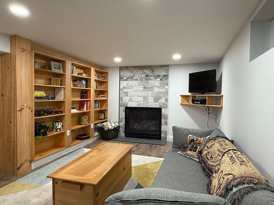 Fireplace, Interior, Living room, Marble Walls, Recessed Lighting, Stone Walls, Wood Texture Flooring