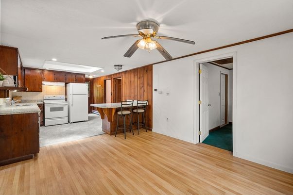 Interior, Kitchen, Recessed Lighting, Washer, Wood Texture Flooring