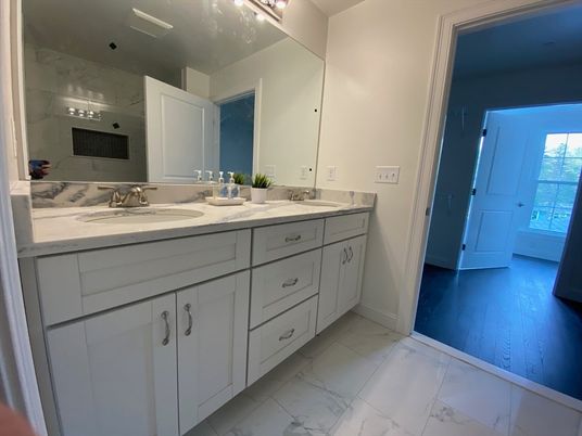 Bathroom, Dual Sink Vanities, Interior, Marble, Marble Walls, Wood Texture Flooring