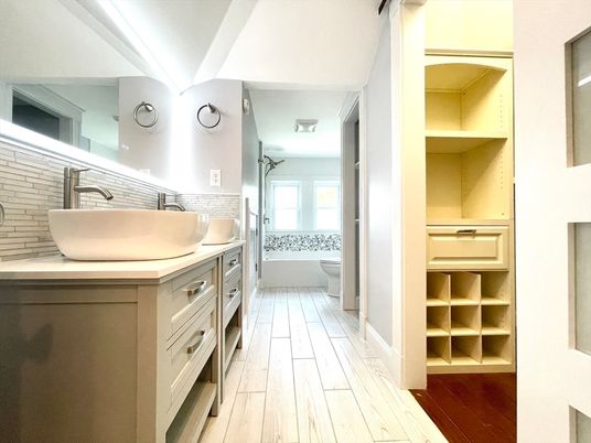 Bathroom, Dual Sink Vanities, Free Standing Baths, Interior, Wood Texture Flooring