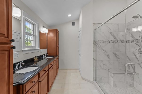 Bathroom, Dual Sink Vanities, Glass Shower, Interior, Marble Walls, Recessed Lighting
