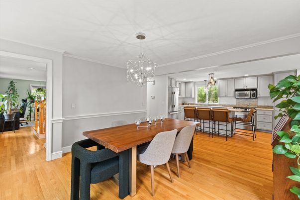 Dining room, Interior, Kitchen, Pendant Lights, Recessed Lighting, Stainless Steel Appliances, Wood Texture Flooring