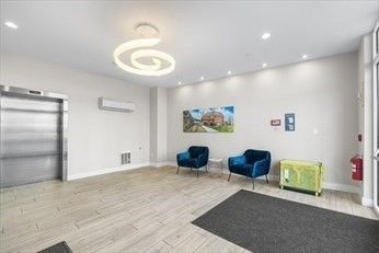 Elevator, Interior, Pendant Lights, Recessed Lighting, Wood Texture Flooring