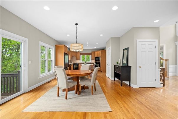 Chandelier, Dining room, Interior, Kitchen, Recessed Lighting, Stainless Steel Appliances, Wood Texture Flooring