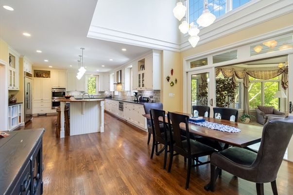 Chandelier, Dining room, Interior, Kitchen, Pendant Lights, Recessed Lighting, Stainless Steel Appliances, Wood Texture Flooring