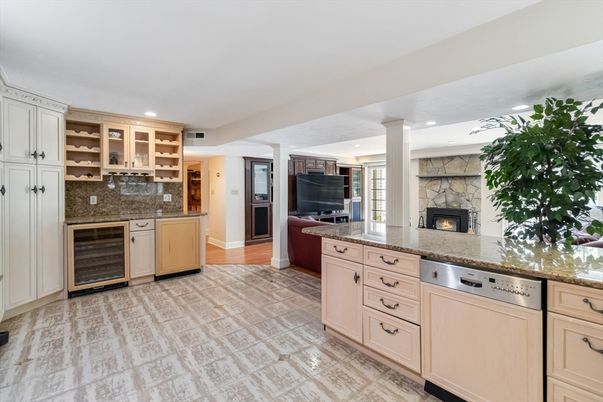 Fireplace, Interior, Kitchen, Living room, Recessed Lighting, Stone Walls, Wood Texture Flooring