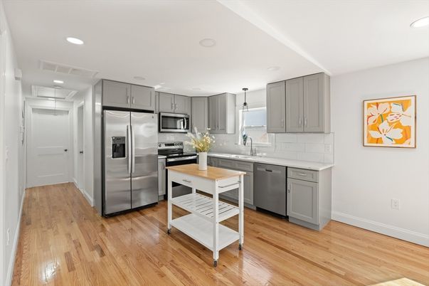 Interior, Kitchen, Pendant Lights, Recessed Lighting, Stainless Steel Appliances, Wood Texture Flooring
