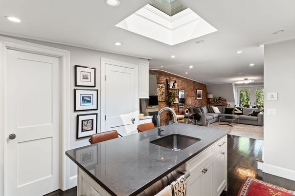 Dining room, Fireplace, Interior, Kitchen, Living room, Recessed Lighting, Stone Walls, Wood Texture Flooring
